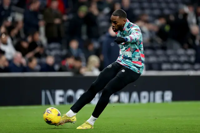 Ivan Toney of Brentford shoots as he warms up