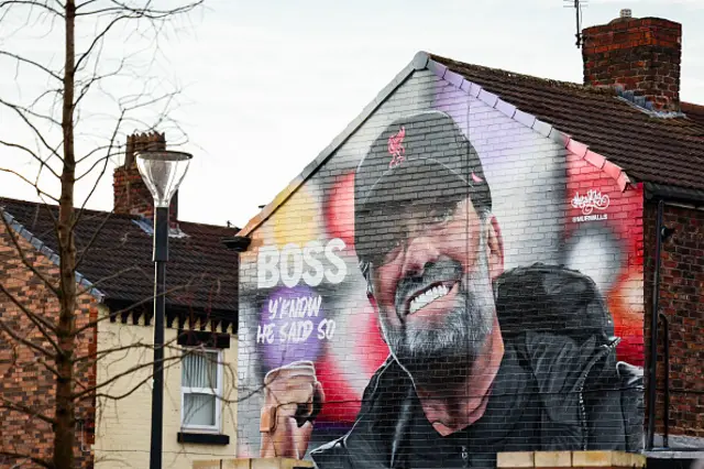 Jurgen Klopp mural on a wall outside Anfield