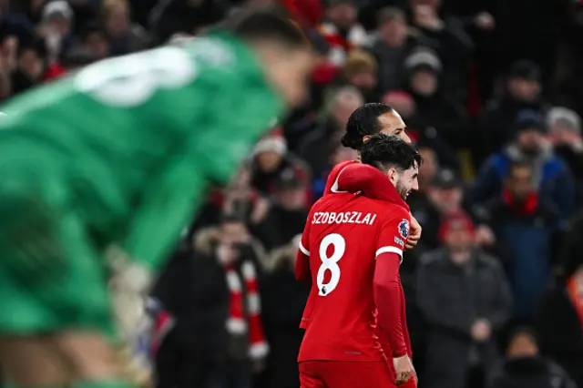 Dominik Szoboszlai celebrates with Virgil van Dijk