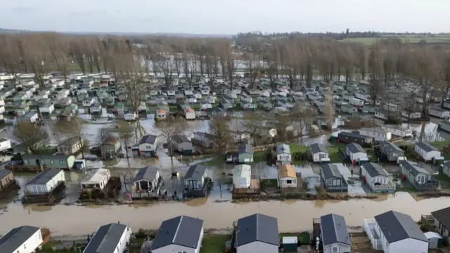 In this aerial view, water levels at Billings Aquadome holiday park begin to subside after flooding on January 04, 2024 in Northampton, United Kingdom.