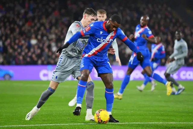 Schlupp holds off a challenge from Garner.