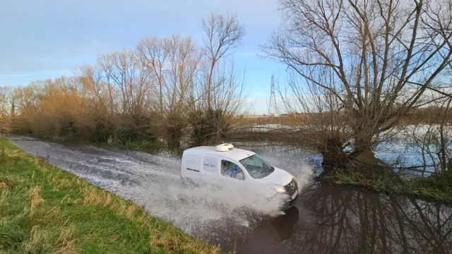 A van in floodwater in Oxfordshire