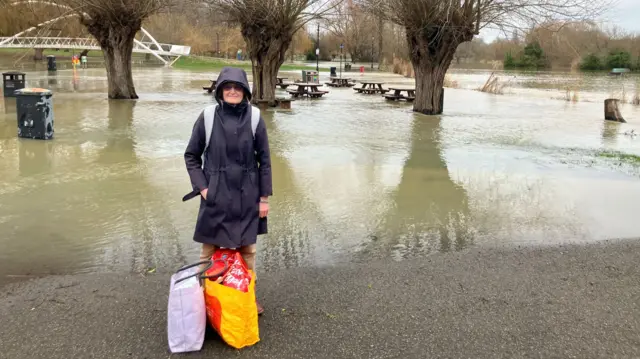 Janet Bowler at flood water in Bedford