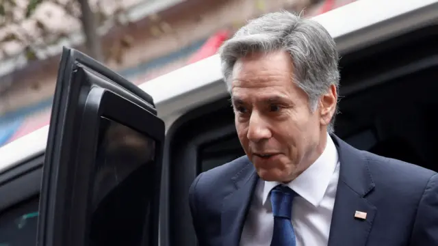 Antony Blinken steps out of a US government car on a recent visit to Mexico City