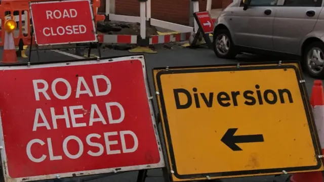 Road closure signs