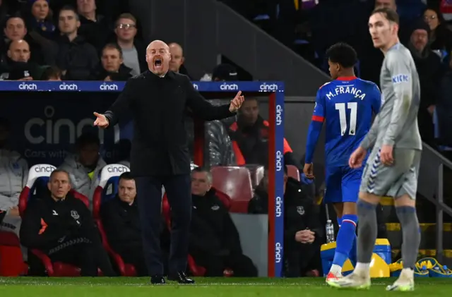 Sean Dyche shouts at his side from the dugout.