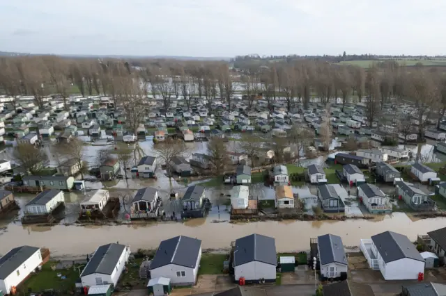 In this aerial view, water levels at Billings Aquadome holiday park begin to subside after flooding on January 04, 2024 in Northampton, United Kingdom