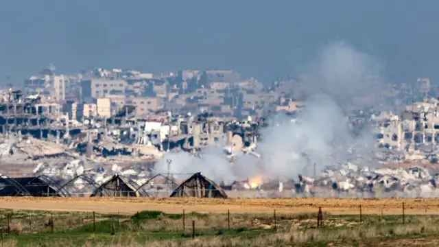 A picture taken from a position in southern Israel along the border with the Gaza Strip, shows smoke billowing over the Palestinian territory during Israeli bombardment on January 4, 2024, amid continuing battles between Israel and the militant group Hamas.