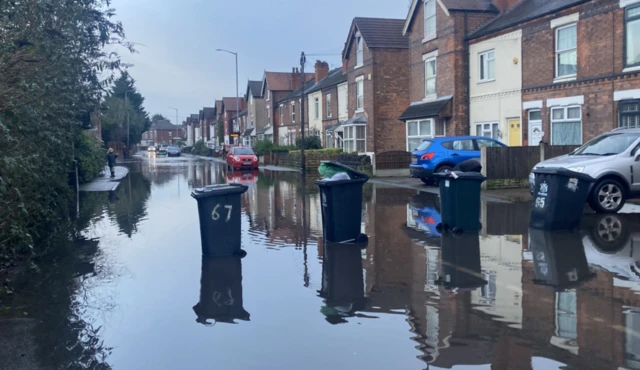 Bins in flood water