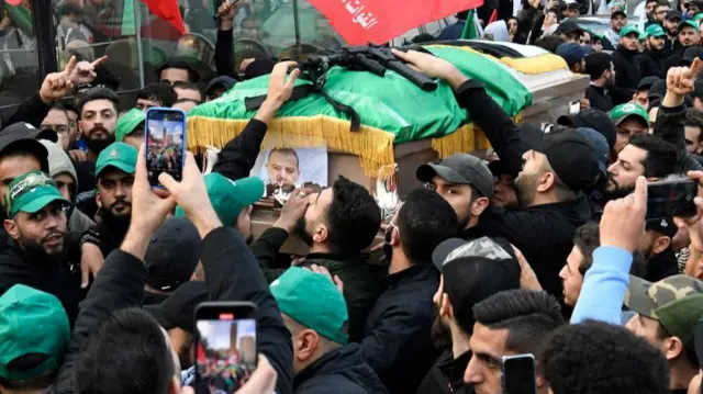 Mourners carry the coffin of Hamas deputy leader Saleh al-Arouri, and the others killed in a drone attack, during his funeral in Beirut, Lebanon, 04 January 2024.