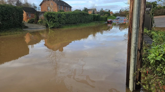 Flooded road in Maisemore