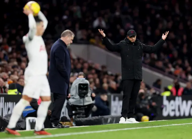 Kompany holds his hands up in disbelief.