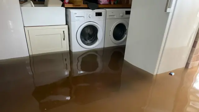 Appliances sitting in 1ft of water.