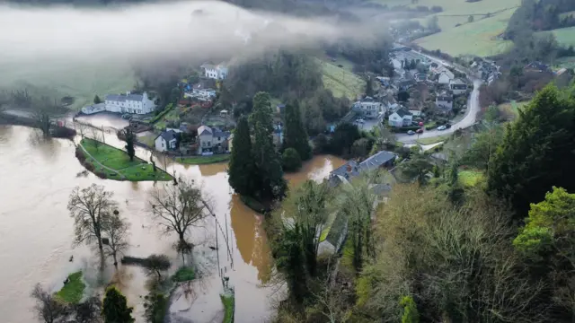 Aerial shot of flooded Lydbrook with clouds in the shot