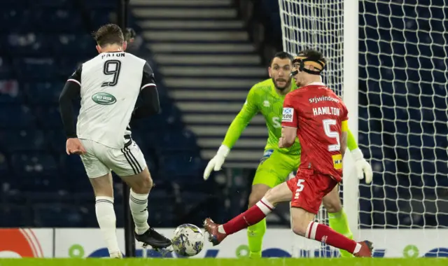 Ruari Paton tucks the ball away, but the goal would not stand