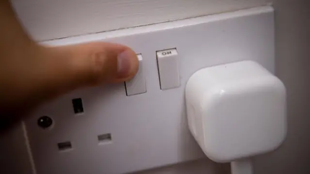 A power socket switch at a home in London, Britain, 23 August 2022. Bills regulator Ofgem is set to announce the next energy price cap on 26 August and the rising energy prices is likely to push UK inflation further. Energy bills could hit nearly three times higher than last winter and half of UK households could be facing fuel poverty in the winter according to EDF energy company.