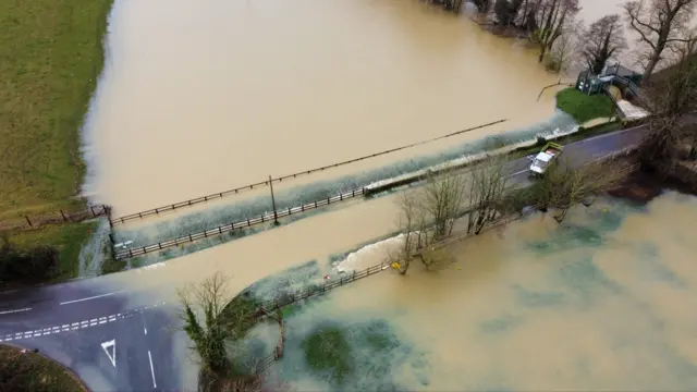 Aerial view of the River Rat flood water and the B1115 near Stowmarket