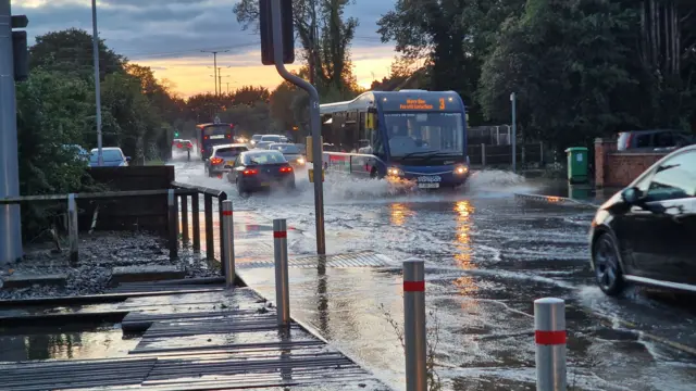 Bus on flooded road