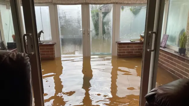 The interior of a flooded house.