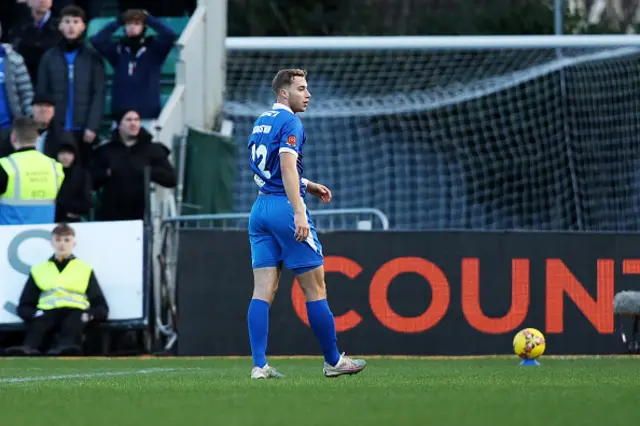 George Langston of Eastleigh looks dejected as he leaves the field after receiving a red card