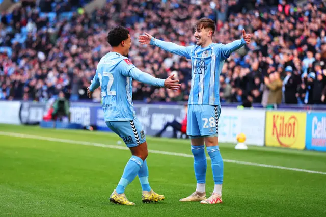 Joel Latibeaudiere of Coventry City celebrates with Josh Eccles of Coventry City after scoring