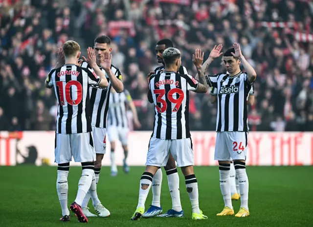 Newcastle players high five each other