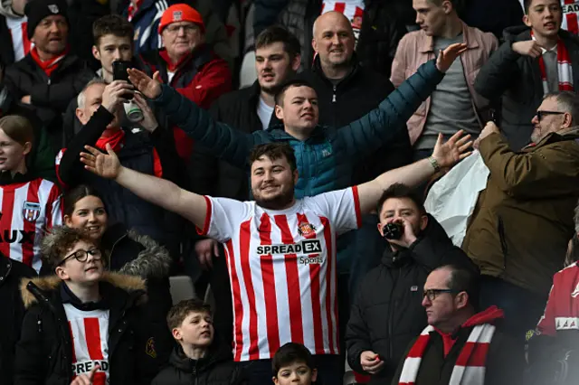 Sunderland fans build the atmosphere in the crowd