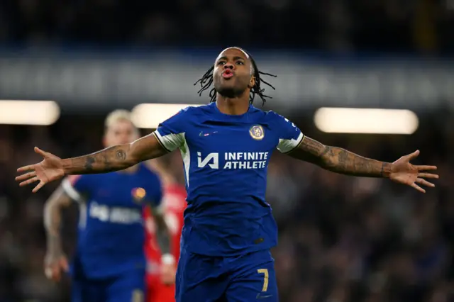 Raheem Sterling celebrates scoring for Chelsea