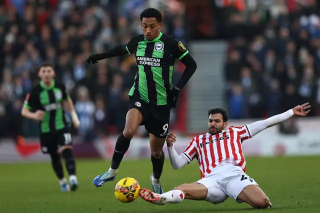 Mehdi Leris tackles Brighton's Brazilian striker Joao Pedro