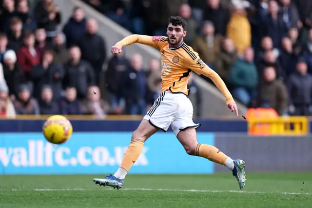 Tom Cannon of Leicester City scores his team's third goal