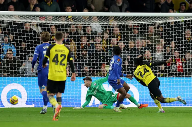 Tom Dele-Bashiru of Watford scores