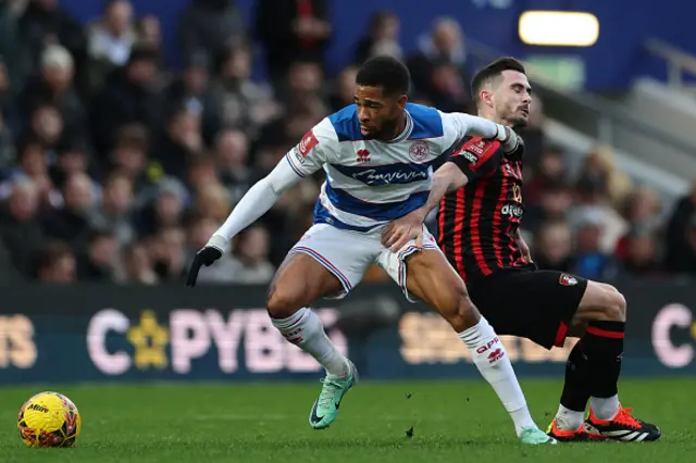 Elijah Dixon-Bonner vies with Bournemouth's English midfielder Lewis Cook