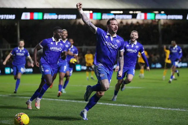 Chris Maguire of Eastleigh celebrates scoring