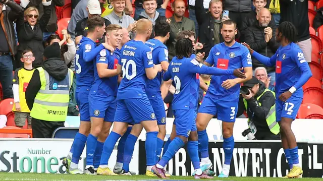 Harrogate players celebrate their winning goal when they beat Doncaster earlier in the season