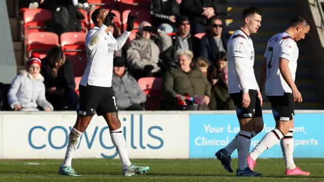 Nathaniel Mendez-Laing celebrates his goal against Fleetwood