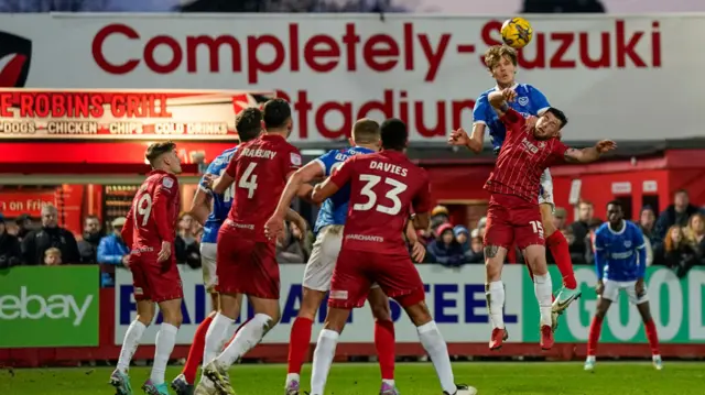 Portsmouth and Cheltenham in action