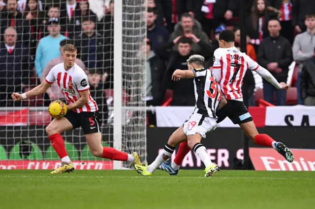 Bruno Guimaraes of Newcastle United shoots against Daniel Ballard