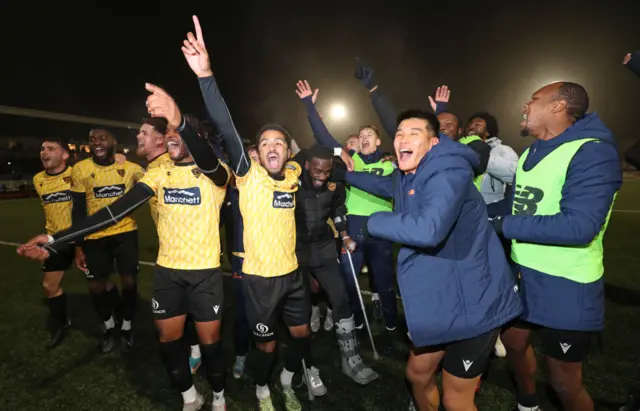 Maidstone United players celebrate