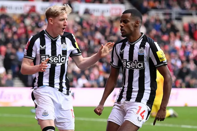 Alexander Isak of Newcastle United celebrates with Anthony Gordon