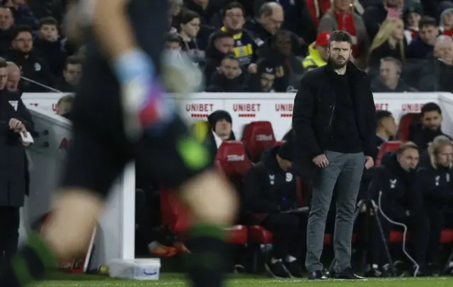 Michael Carrick looks on from the touchline