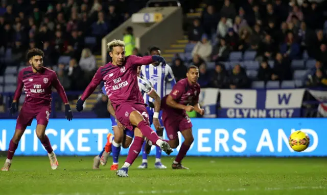 : Cameron Dawson of Sheffield Wednesday (not pictured) saves the penalty of Callum Robinson