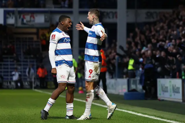 Lyndon Dykes celebrates with Queens Park Rangers' Irish striker Sinclair Armstrong