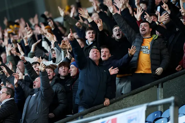 Fans of Cambridge United celebrate