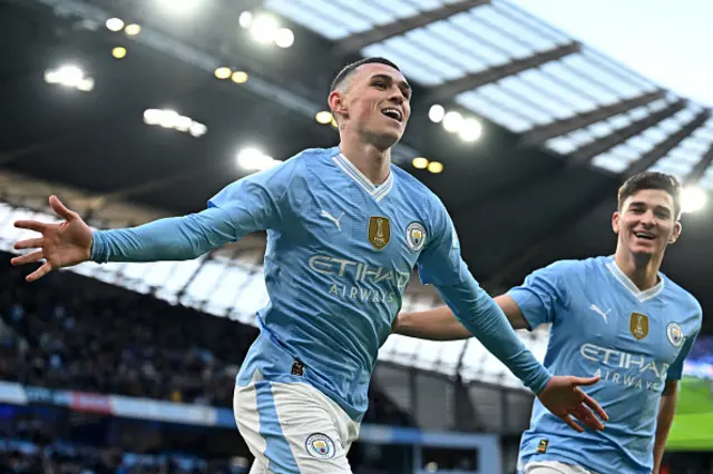 Phil Foden celebrates with Manchester City's Argentinian striker Julian Alvarez