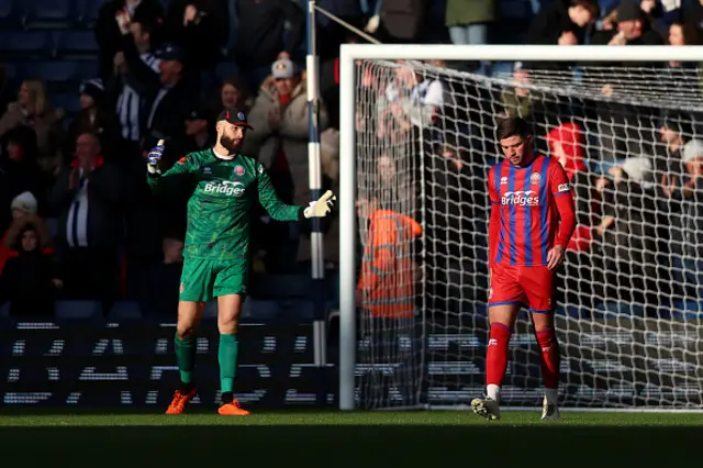 Cian Harries of Aldershot Town reacts