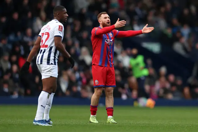 Theo Widdrington of Aldershot Town reacts