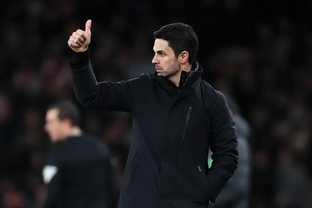 Mikel Arteta, Manager of Arsenal, gestures a thumbs up on the touchline