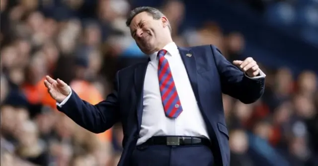 Aldershot Town manager Tommy Widdrington gestures on the touchline