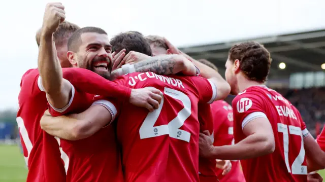 Wrexham celebrate Tom O'Connor's goal