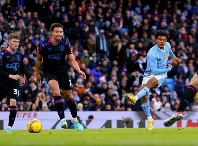 Oscar Bobb attempts a shot on goal